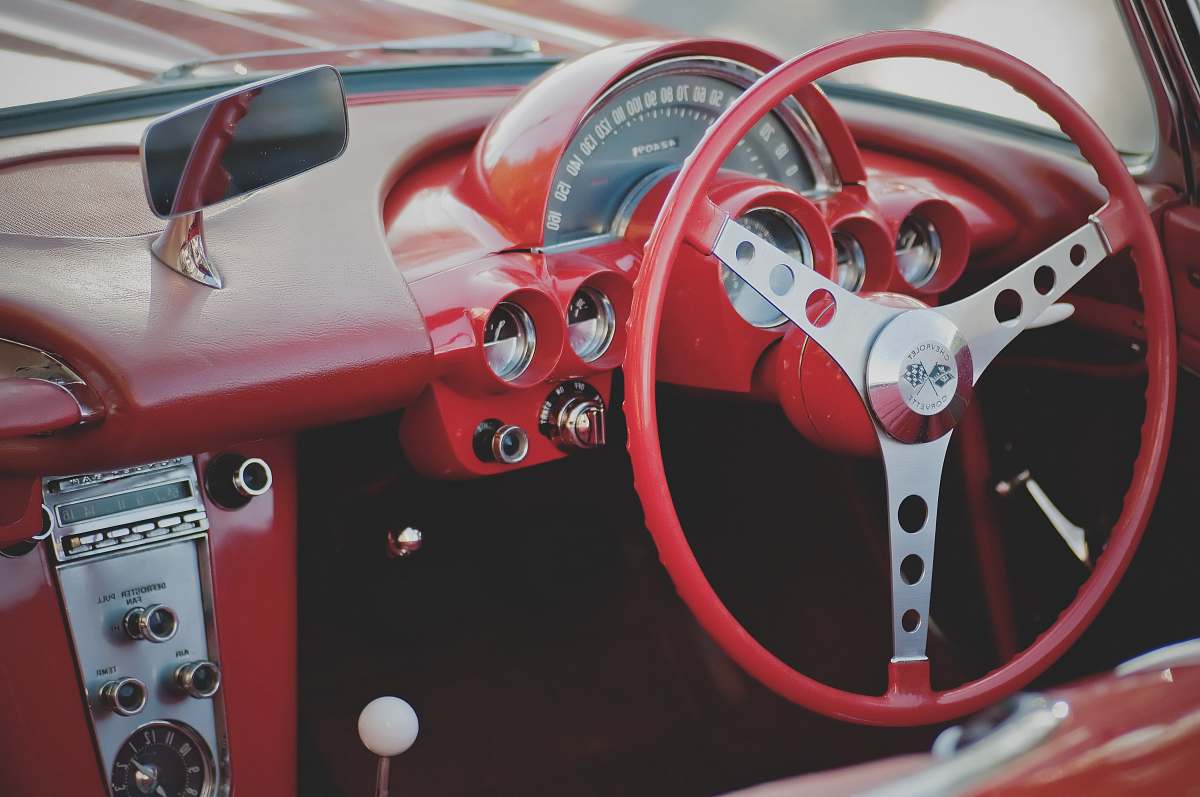 steering wheel closeup photo of car steering wheel red